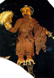 Vase fragment showing costumed actor with mask